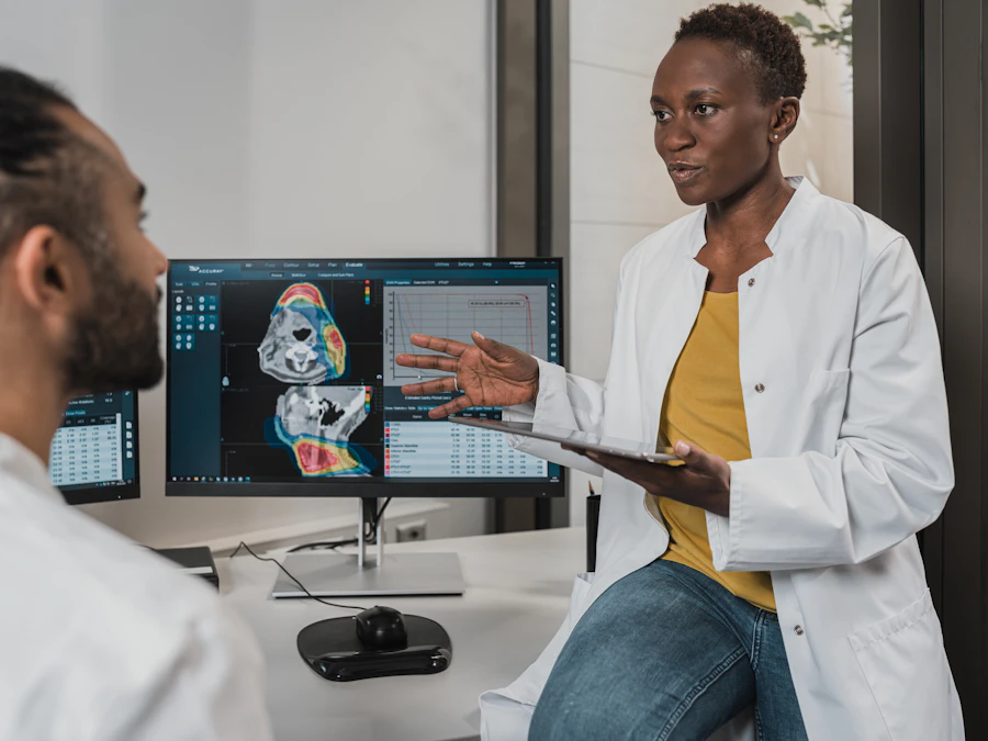 Doctor walking a patient through their results on screen